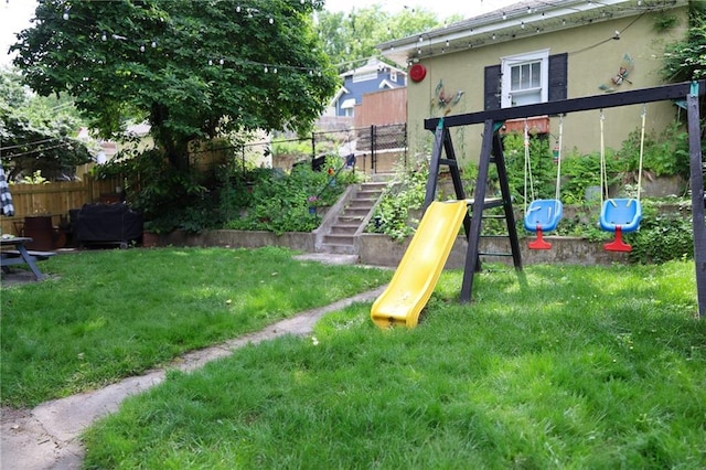 2220 Eugene Field Ave, Saint Joseph, MO 64505 - view of jungle gym featuring stairs