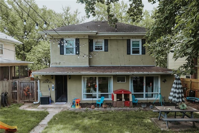 2220 Eugene Field Ave, Saint Joseph, MO 64505 - back of property featuring stucco siding and roof with shingles