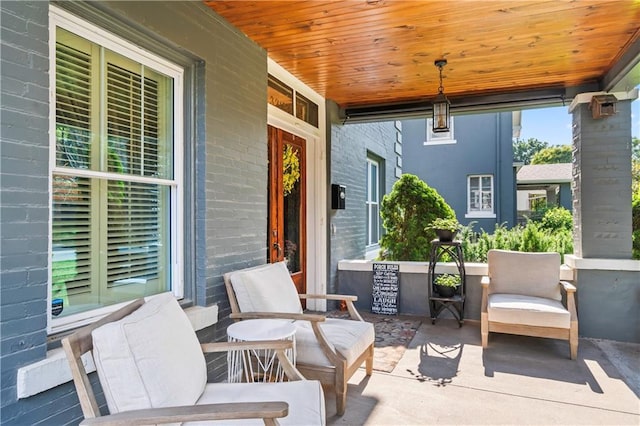 3215 Windsor Ave, Kansas City, MO 64123 - view of covered porch