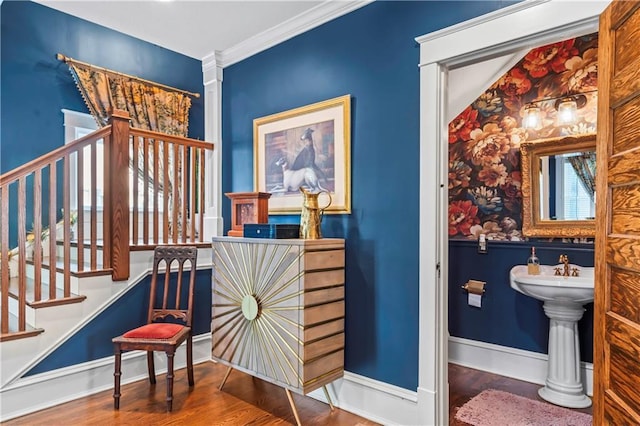 3215 Windsor Ave, Kansas City, MO 64123 - stairs featuring wood finished floors and ornamental molding
