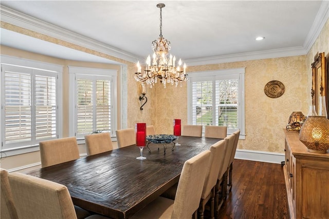 3215 Windsor Ave, Kansas City, MO 64123 - dining room with dark wood-type flooring, ornamental molding, a chandelier, wallpapered walls, and recessed lighting