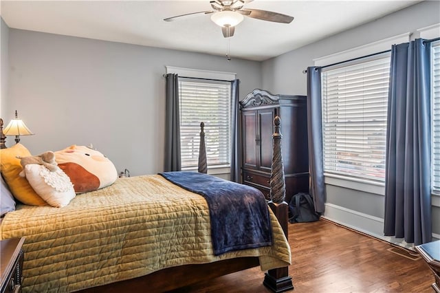 3215 Windsor Ave, Kansas City, MO 64123 - bedroom with wood finished floors and ceiling fan