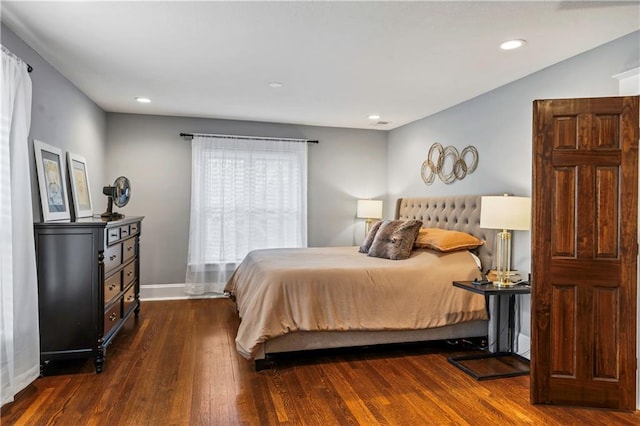 3215 Windsor Ave, Kansas City, MO 64123 - bedroom with dark wood-type flooring and recessed lighting