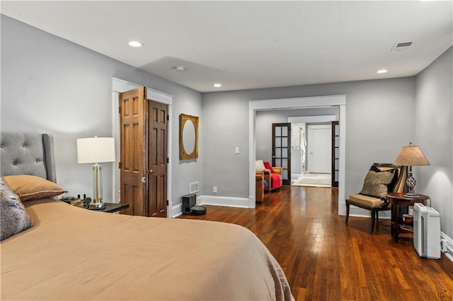 3215 Windsor Ave, Kansas City, MO 64123 - bedroom with wood finished floors and recessed lighting