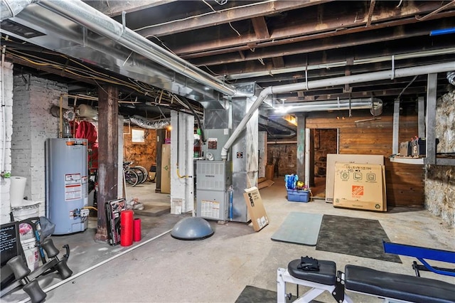 3215 Windsor Ave, Kansas City, MO 64123 - unfinished below grade area featuring gas water heater and heating unit