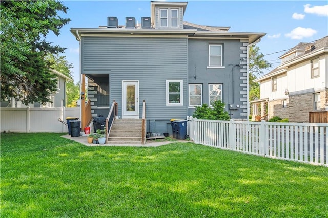 3215 Windsor Ave, Kansas City, MO 64123 - back of house featuring a fenced backyard