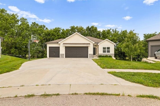19709 W 198th Ct, Spring Hill, KS 66083 - view of front facade with a front lawn, concrete driveway, stone siding, an attached garage, and view of scattered trees