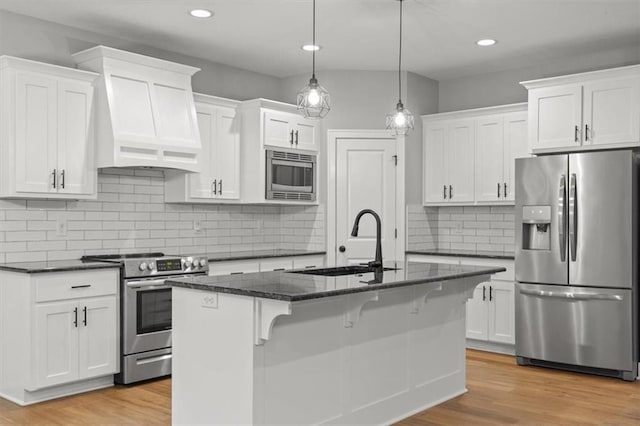19709 W 198th Ct, Spring Hill, KS 66083 - kitchen featuring stainless steel appliances, white cabinets, light wood-style floors, and recessed lighting