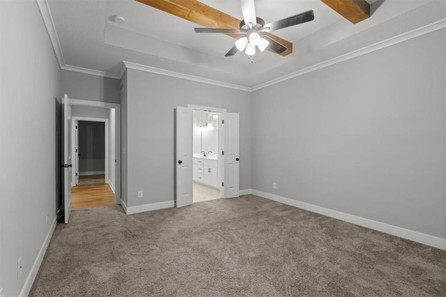19709 W 198th Ct, Spring Hill, KS 66083 - unfurnished bedroom with light colored carpet, a raised ceiling, crown molding, ceiling fan, and ensuite bath