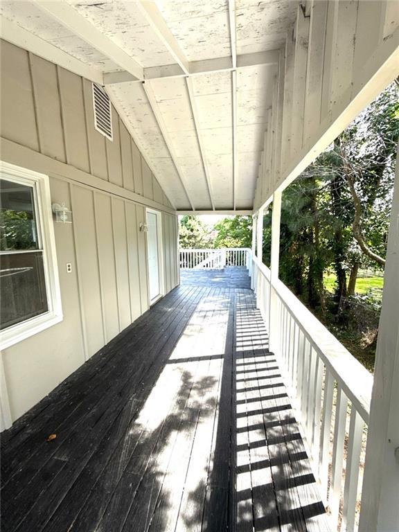 2017 E 83rd Ter, Kansas City, MO 64132 - view of wooden deck