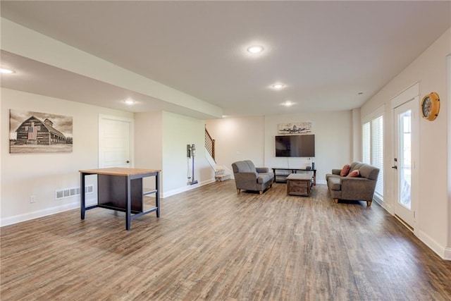 12750 Larkspur Ln, Platte City, MO 64079 - living room with wood finished floors, stairway, and recessed lighting