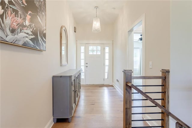 12750 Larkspur Ln, Platte City, MO 64079 - entryway featuring hardwood / wood-style floors and baseboards