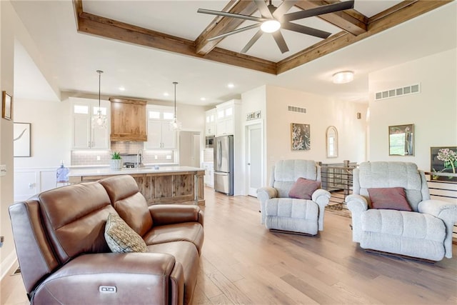 12750 Larkspur Ln, Platte City, MO 64079 - living room with light wood-type flooring, beamed ceiling, recessed lighting, a ceiling fan, and coffered ceiling