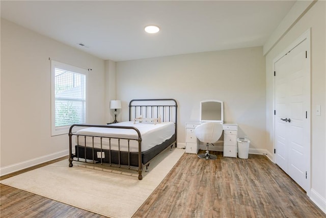 12750 Larkspur Ln, Platte City, MO 64079 - bedroom with wood finished floors and recessed lighting