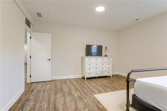 12750 Larkspur Ln, Platte City, MO 64079 - bedroom with wood finished floors and baseboards