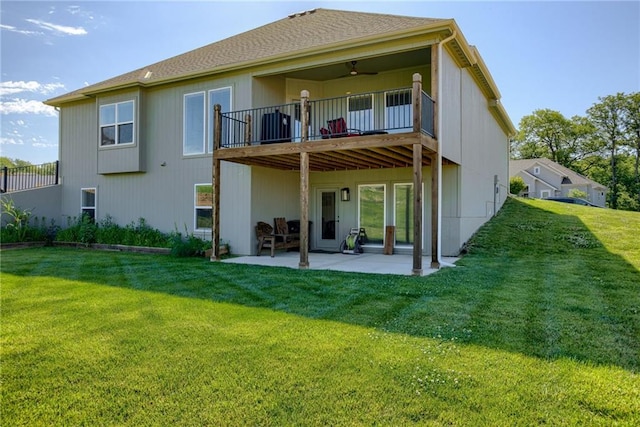 12750 Larkspur Ln, Platte City, MO 64079 - rear view of house with a patio area, a yard, and a ceiling fan