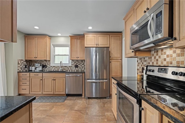 13924 S Summertree Ln, Olathe, KS 66062 - kitchen featuring appliances with stainless steel finishes, tasteful backsplash, light brown cabinets, and recessed lighting