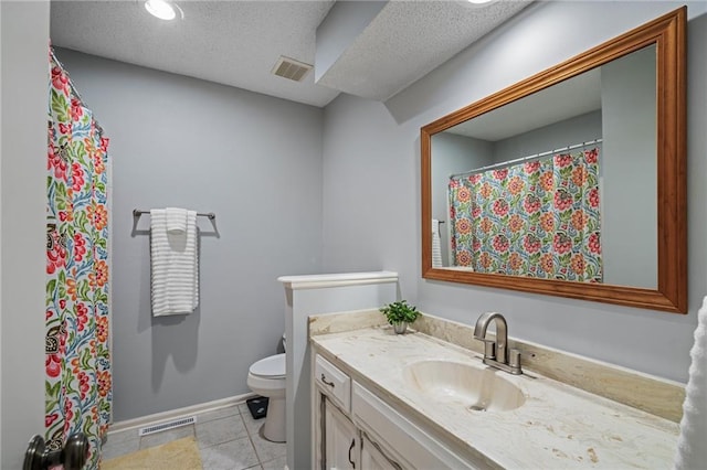 13924 S Summertree Ln, Olathe, KS 66062 - bathroom with vanity, tile patterned flooring, a textured ceiling, and a shower with shower curtain