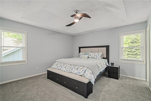 13924 S Summertree Ln, Olathe, KS 66062 - carpeted bedroom with a textured ceiling and ceiling fan