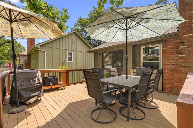 13924 S Summertree Ln, Olathe, KS 66062 - wooden deck featuring outdoor dining area