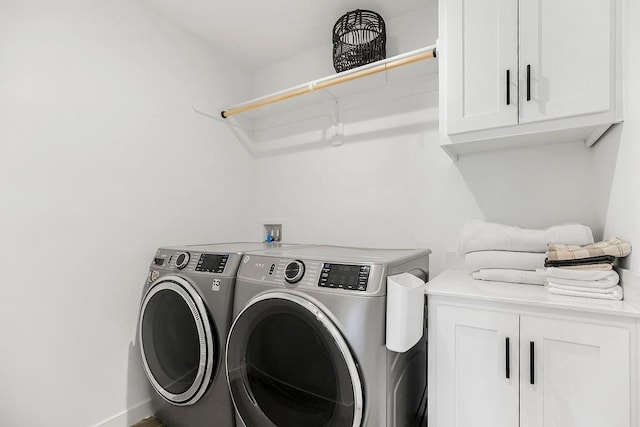 13404 W 177th St, Overland Park, KS 66013 - laundry area featuring washing machine and clothes dryer and cabinet space