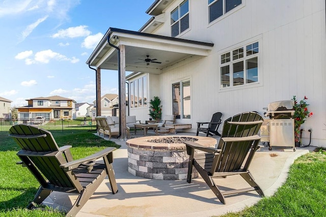 13404 W 177th St, Overland Park, KS 66013 - view of patio featuring a fire pit, ceiling fan, grilling area, and a residential view