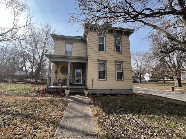 624 S St, Atchison, KS 66002 - italianate house featuring a porch and a chimney