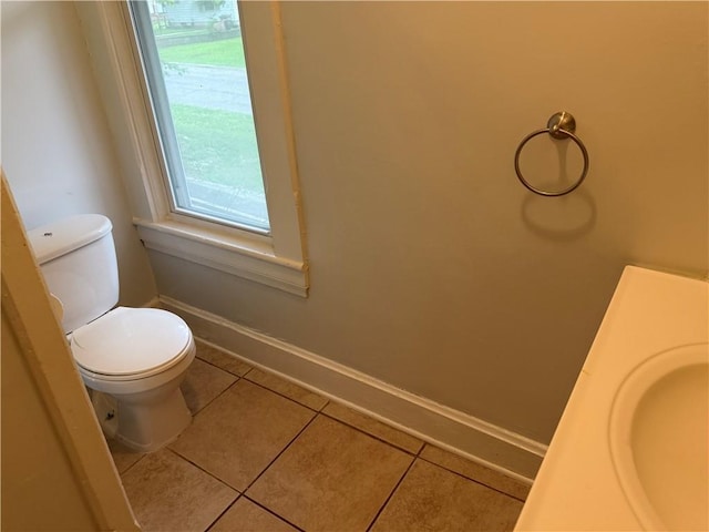 624 S St, Atchison, KS 66002 - bathroom featuring tile patterned flooring and vanity