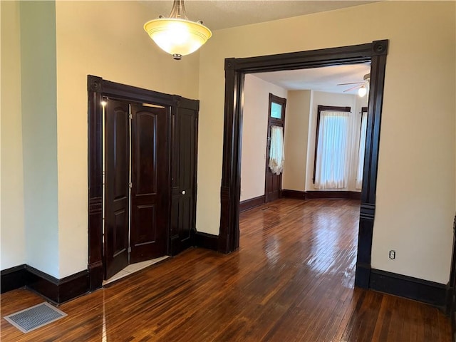 624 S St, Atchison, KS 66002 - entryway featuring dark wood finished floors and ceiling fan
