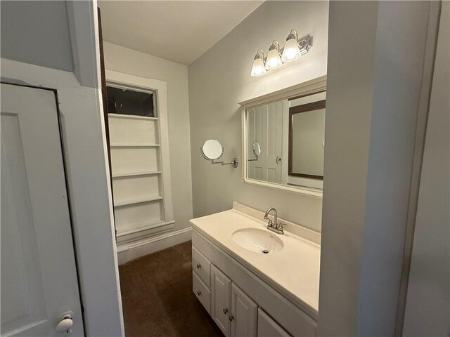 624 S St, Atchison, KS 66002 - bathroom with vanity and built in shelves