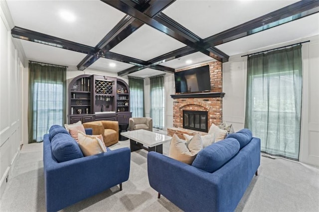 2405 W 124th St, Leawood, KS 66209 - living area with a decorative wall, a brick fireplace, carpet flooring, beam ceiling, and coffered ceiling