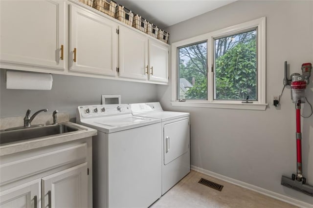 2405 W 124th St, Leawood, KS 66209 - washroom with cabinet space and independent washer and dryer