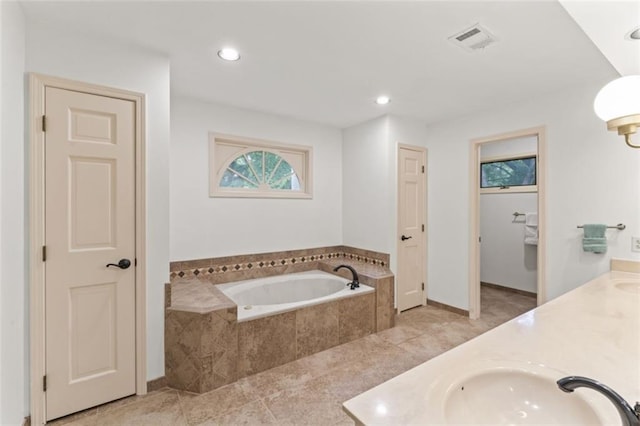 2405 W 124th St, Leawood, KS 66209 - full bathroom with a bath, double vanity, tile patterned floors, and recessed lighting