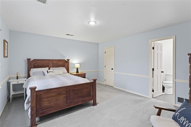 2405 W 124th St, Leawood, KS 66209 - bedroom featuring light carpet and connected bathroom