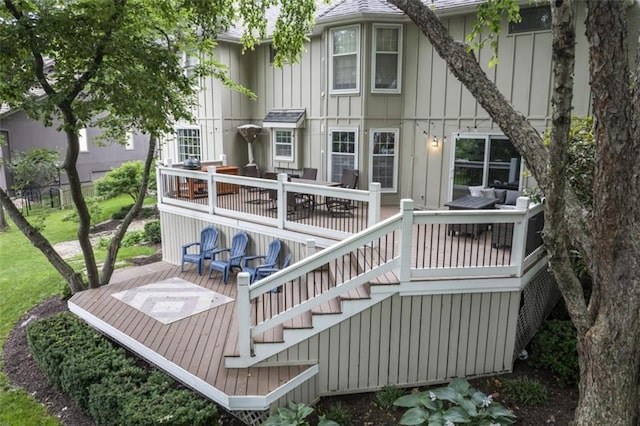 2405 W 124th St, Leawood, KS 66209 - back of property featuring a deck and board and batten siding