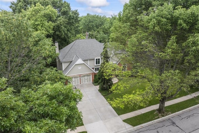 2405 W 124th St, Leawood, KS 66209 - aerial view of property and surrounding area featuring a forest