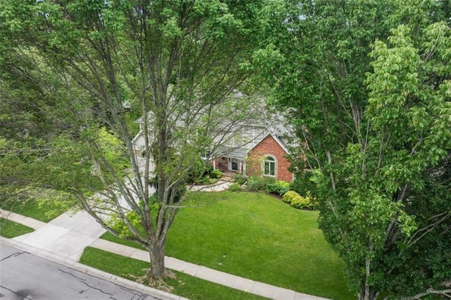 2405 W 124th St, Leawood, KS 66209 - obstructed view of property featuring a front yard