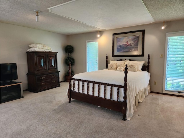 16904 E 36th St S, Independence, MO 64055 - bedroom featuring light carpet and a textured ceiling