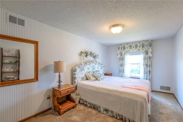 16904 E 36th St S, Independence, MO 64055 - carpeted bedroom featuring wallpapered walls and a textured ceiling