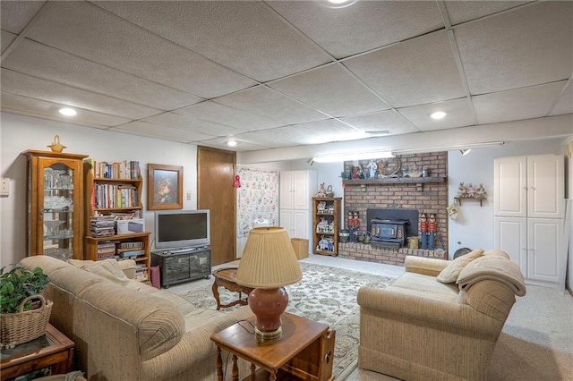 16904 E 36th St S, Independence, MO 64055 - living room with a wood stove, light colored carpet, a drop ceiling, and recessed lighting