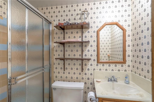 16904 E 36th St S, Independence, MO 64055 - full bath featuring vanity, wallpapered walls, and a shower stall