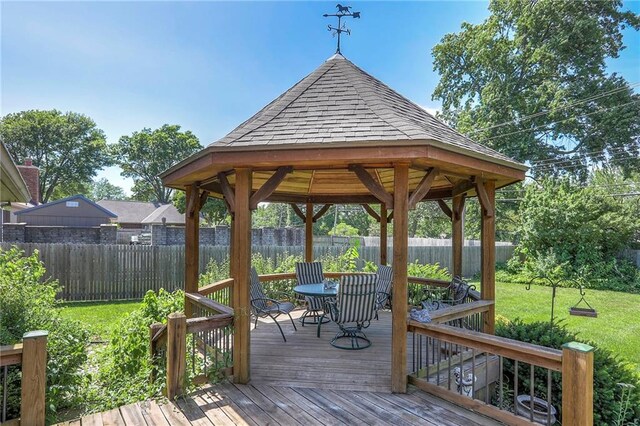 16904 E 36th St S, Independence, MO 64055 - wooden deck with a gazebo, a fenced backyard, and outdoor dining space