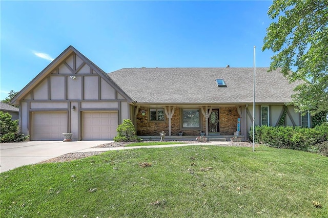 16904 E 36th St S, Independence, MO 64055 - view of front facade with a garage, a front lawn, a shingled roof, and driveway