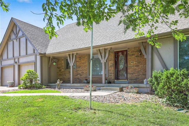 16904 E 36th St S, Independence, MO 64055 - view of front of home with a shingled roof, an attached garage, brick siding, and a front yard