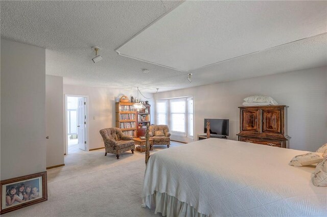 16904 E 36th St S, Independence, MO 64055 - bedroom featuring a textured ceiling and carpet