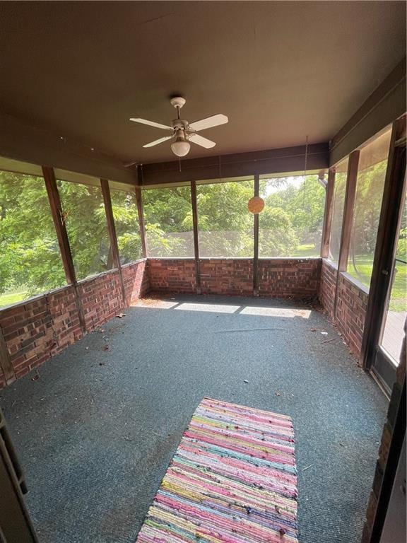 3111 N 35th St, Saint Joseph, MO 64506 - unfurnished sunroom featuring a ceiling fan