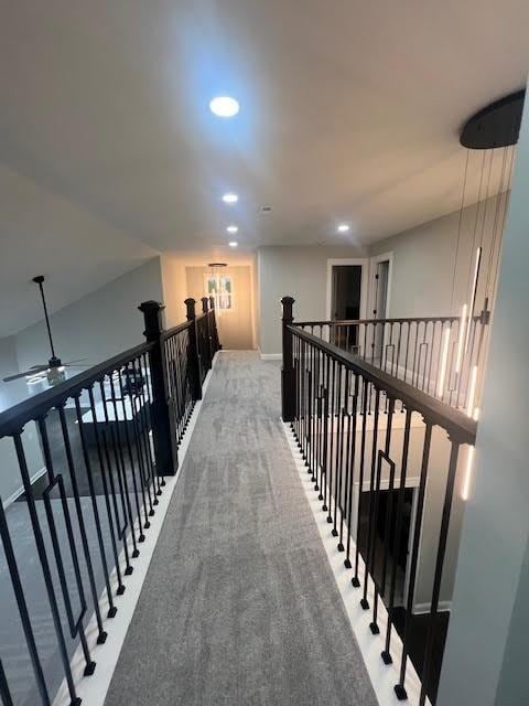 26433 W 144th Ter, Olathe, KS 66061 - corridor with an upstairs landing, recessed lighting, and carpet floors