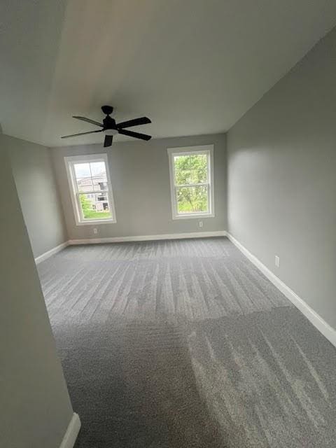 26433 W 144th Ter, Olathe, KS 66061 - unfurnished room featuring plenty of natural light, carpet flooring, and ceiling fan