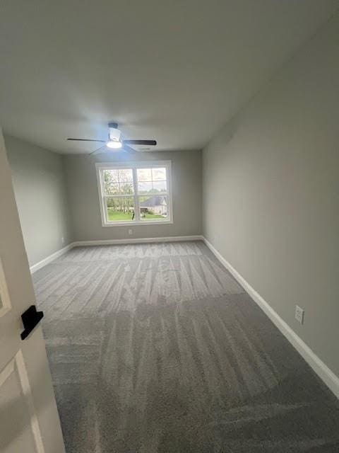 26433 W 144th Ter, Olathe, KS 66061 - carpeted spare room featuring baseboards and ceiling fan