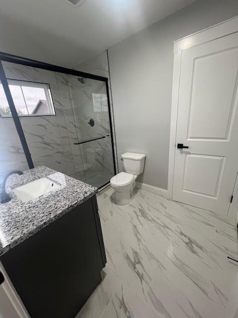 26433 W 144th Ter, Olathe, KS 66061 - bathroom with vanity, marble look tiles, and a marble finish shower